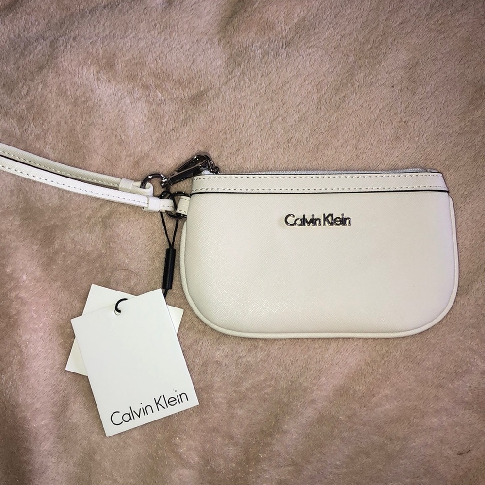 Brand new white Calvin Klein wristlet